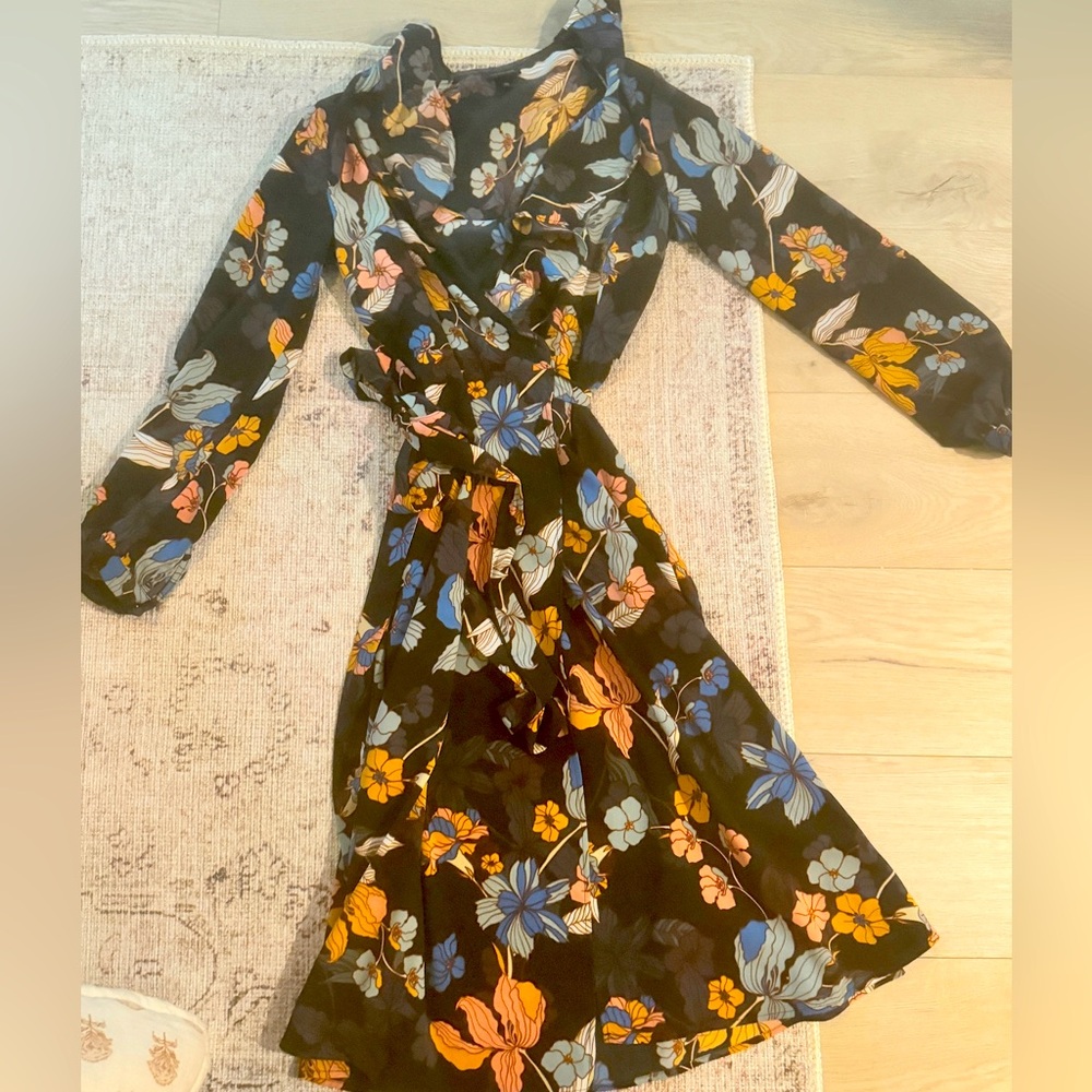Barely worn stylish floral wrap dress